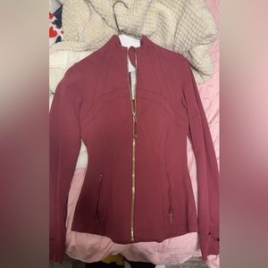 Three lululemon jackets. One scuba jacket and two define jackets.